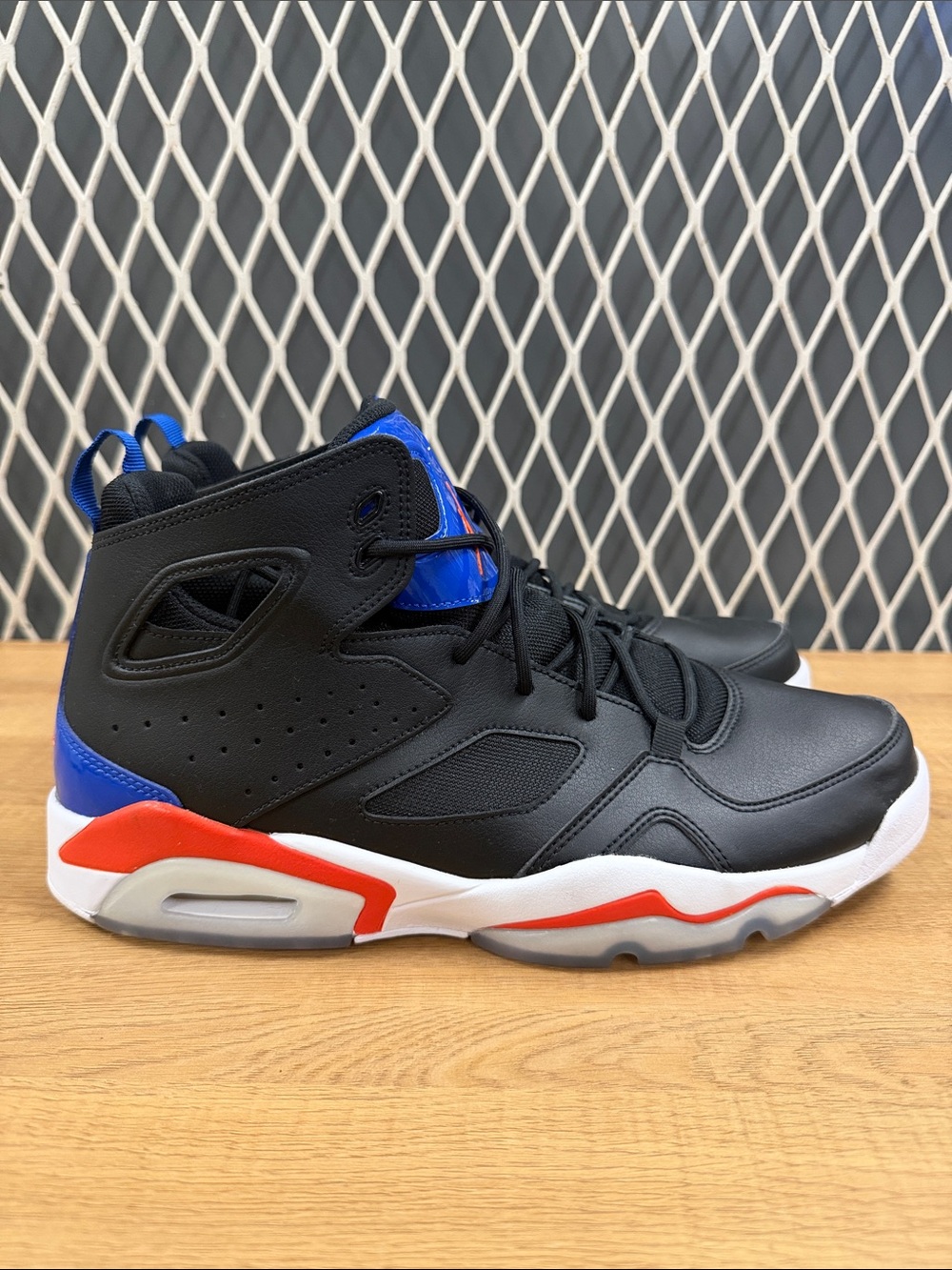 Jordan High-Top Sneakers in Black with Blue and Red Accents